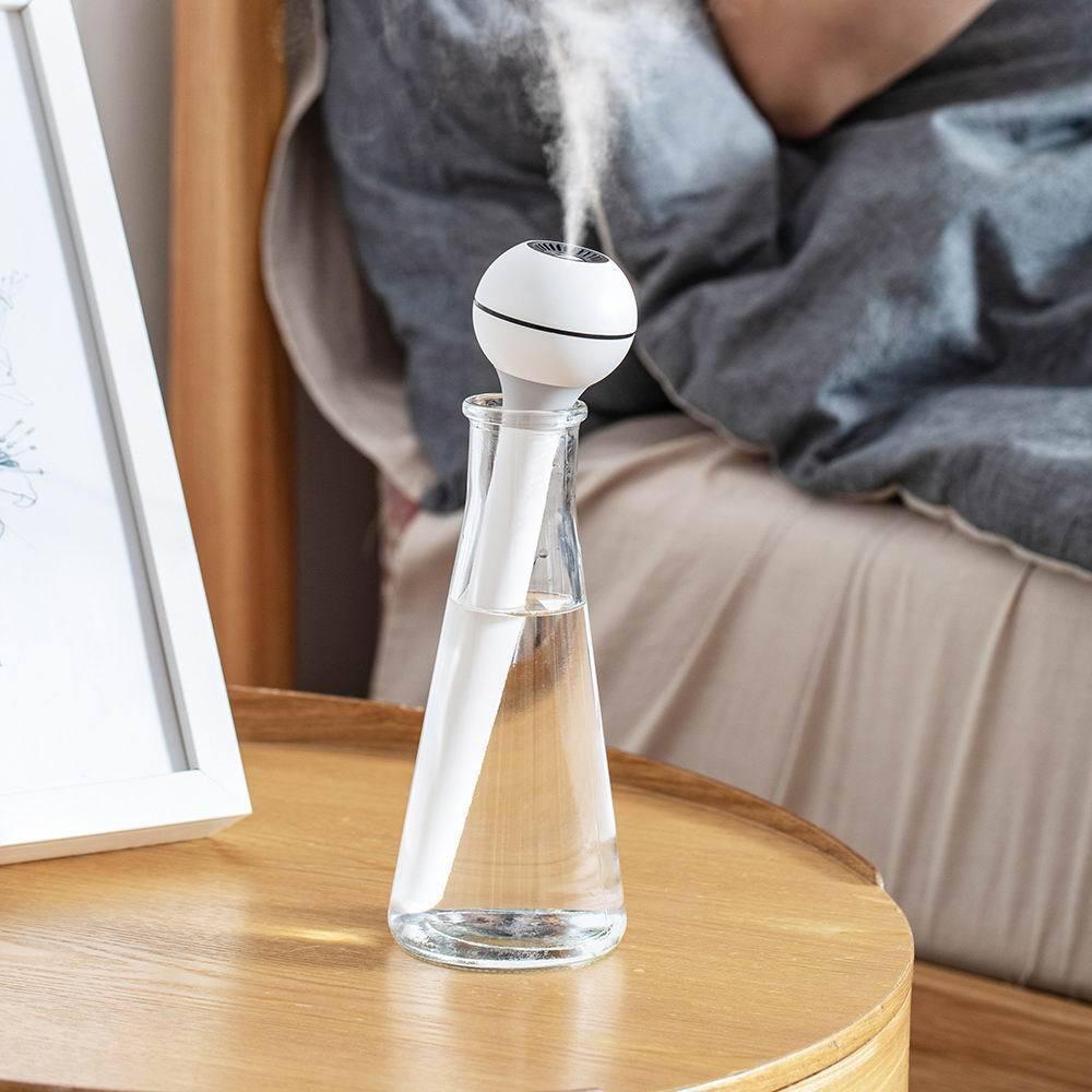 新款创意矿泉水瓶加湿器迷你魔法棒加湿器便携车载用无水箱加湿器